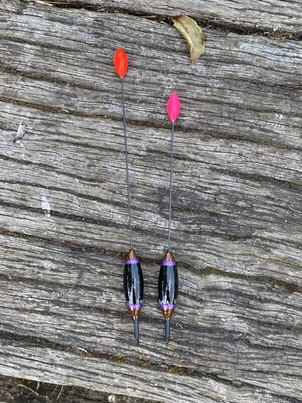 A pair of traditional style carbon stem drift beater floats.