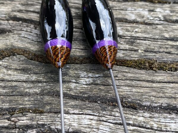 A pair of traditional style carbon stem drift beater floats. - Image 7