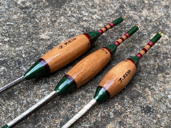 A set of three traditional style crow quill bodied antenna floats. - Image 10