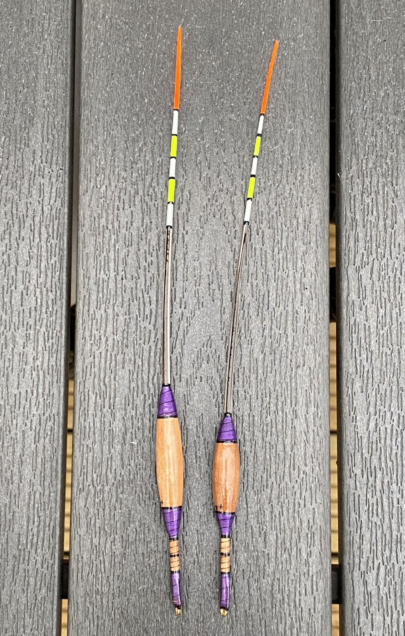 A pair of traditional style crow quill bodied antenna float.