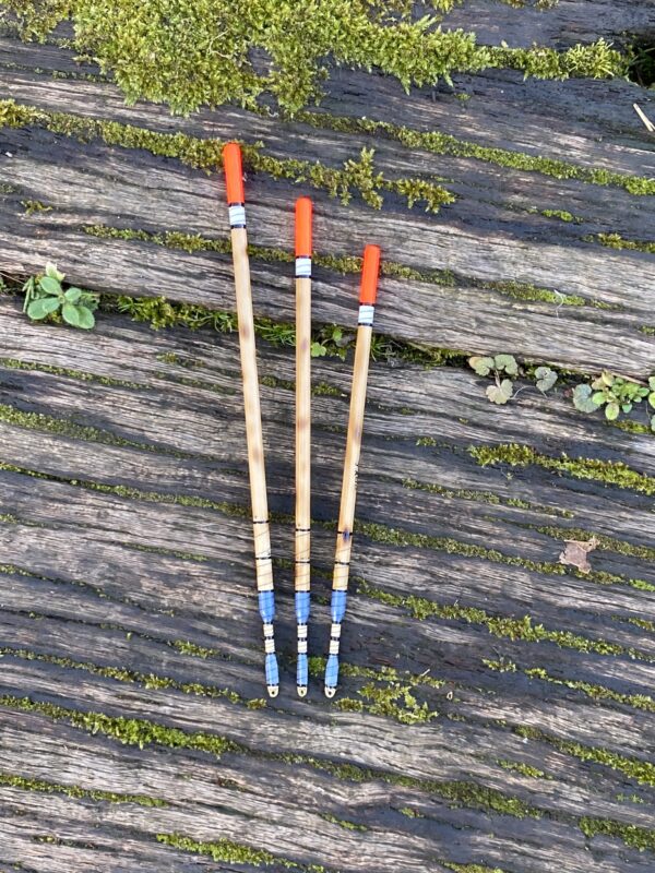 A Set of three traditional style Scorched Reed Wagler floats