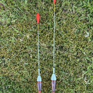 A pair of traditional style carbon stem drift beater floats.