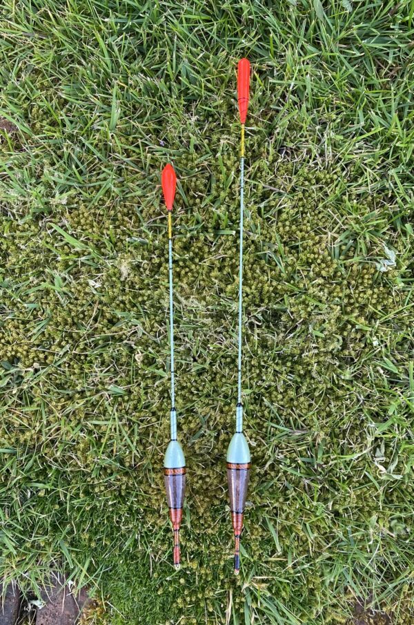 A pair of traditional style carbon stem drift beater floats.