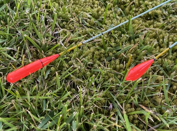 A pair of traditional style carbon stem drift beater floats. - Image 6