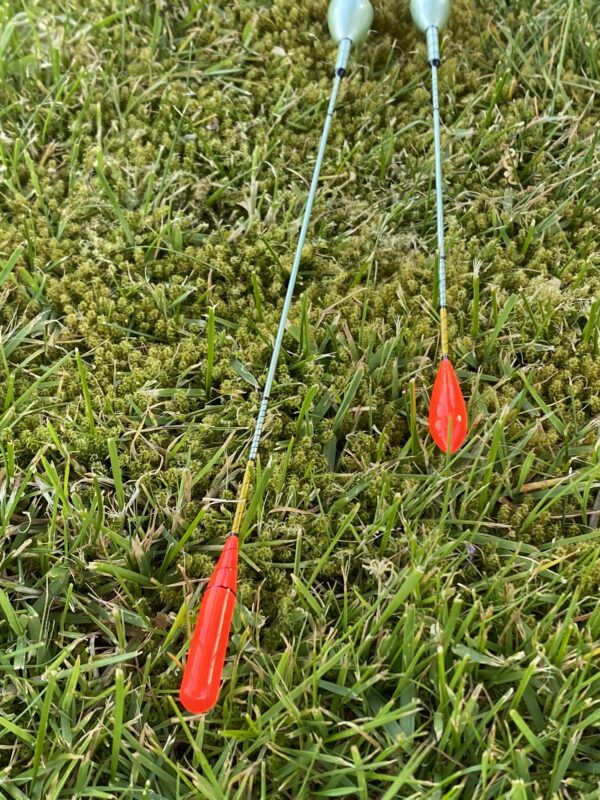 A pair of traditional style carbon stem drift beater floats. - Image 7