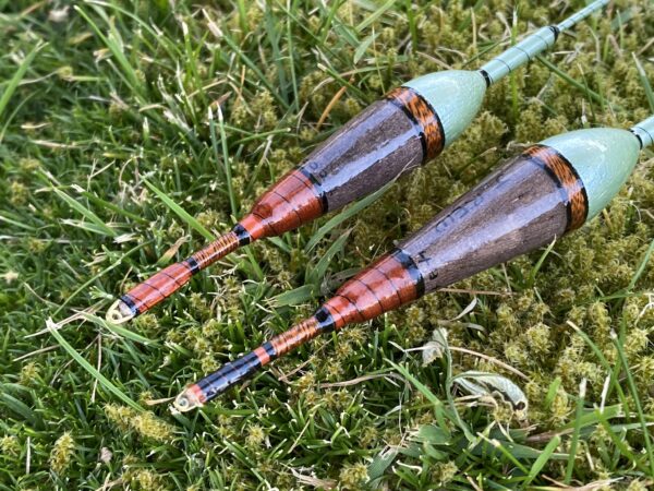 A pair of traditional style carbon stem drift beater floats. - Image 9