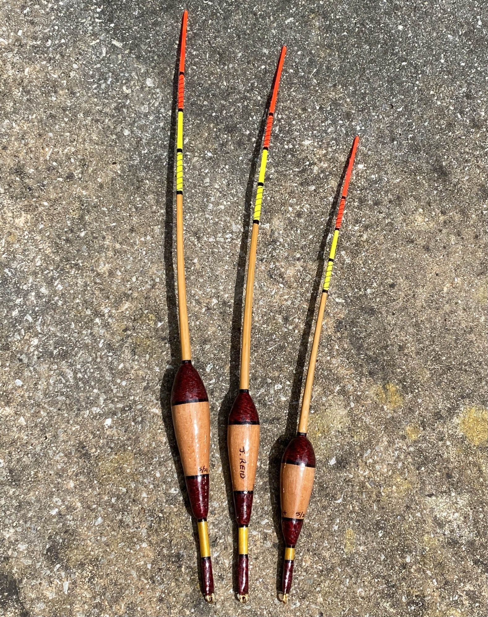 A set of three Traditional style crow quill bodied antenna floats.