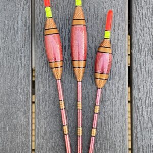 A set of 3 tradition reddish gold Avon style fishing floats