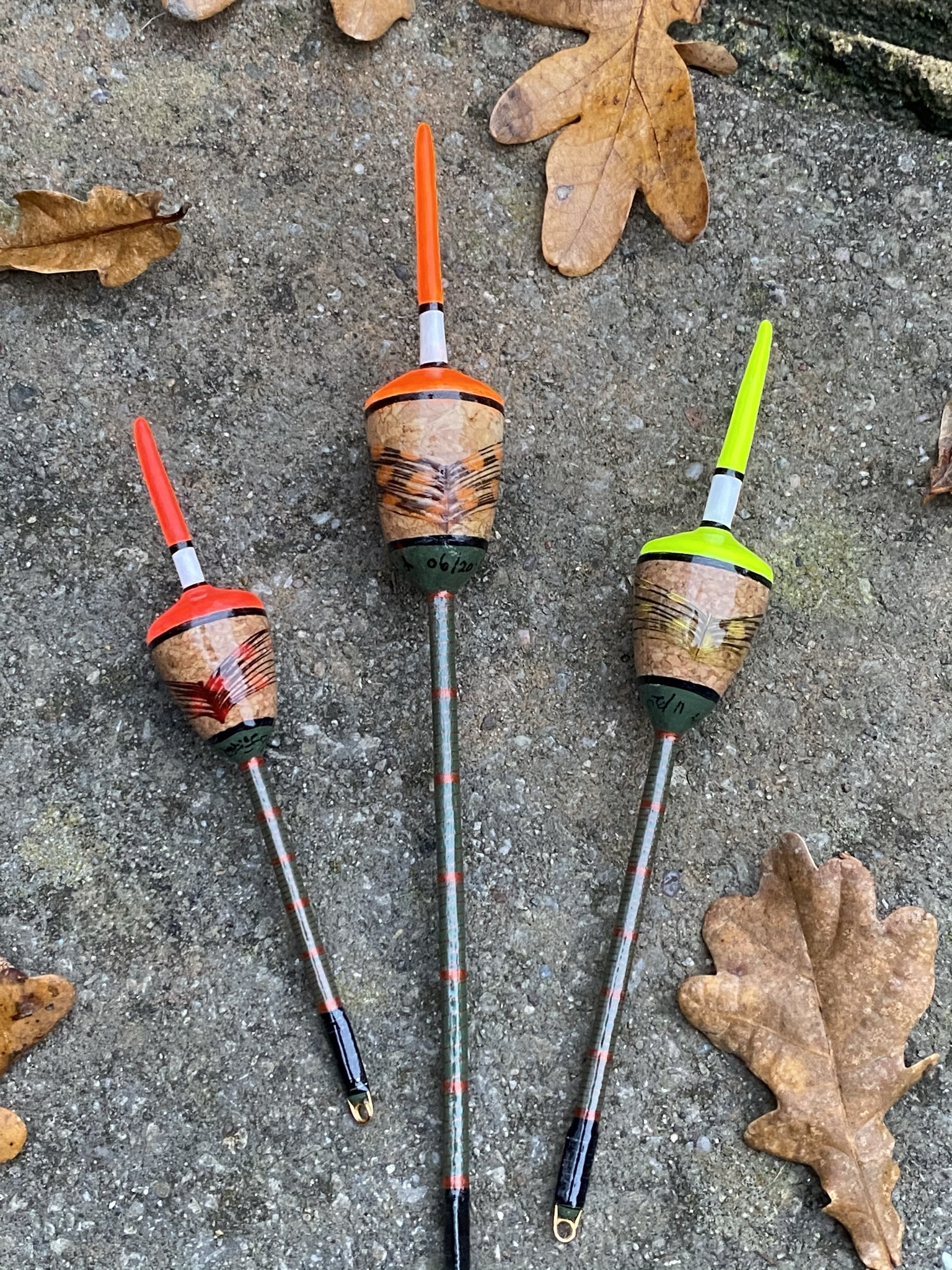 A set of three traditional style Perch bobber floats.