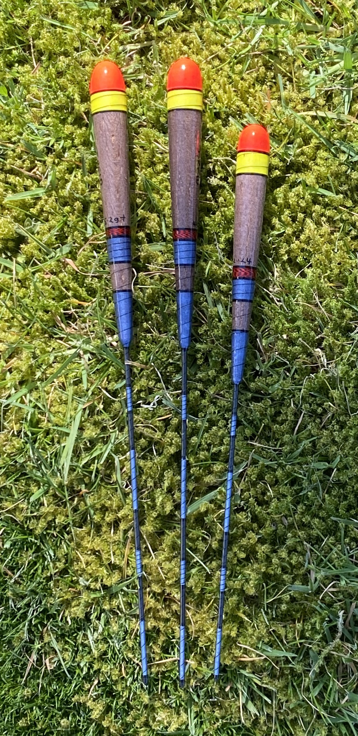 A Set of Three Carbon stem Stick floats.
