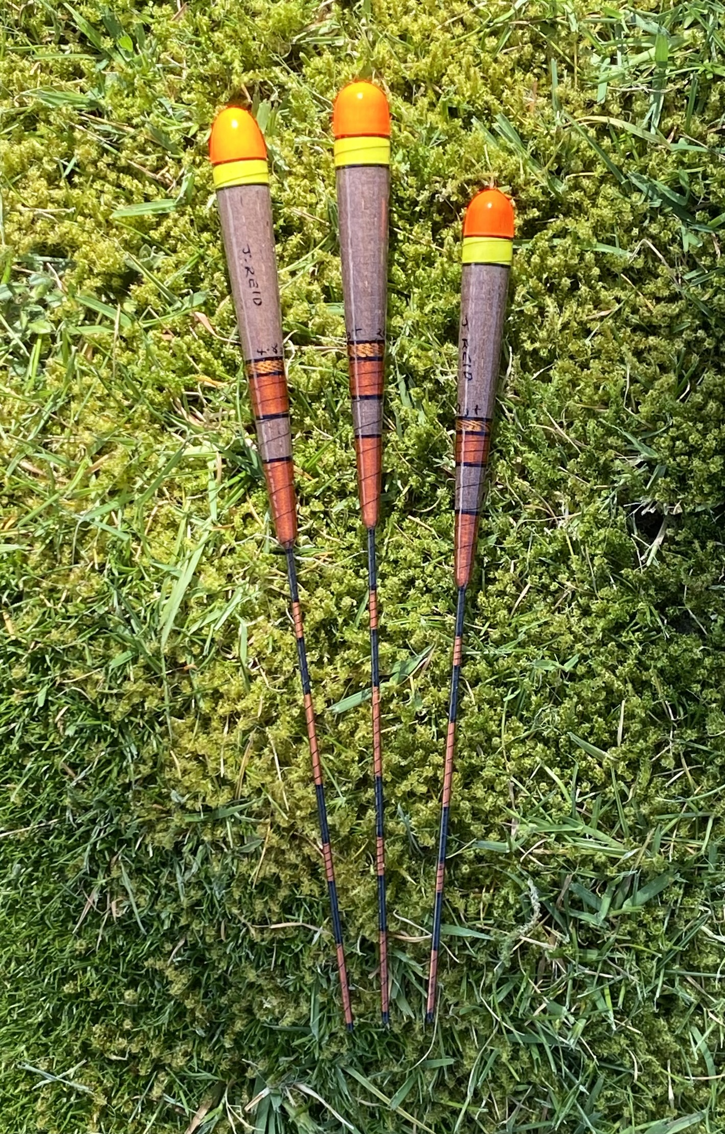 A Set of Three Carbon stem Stick floats.