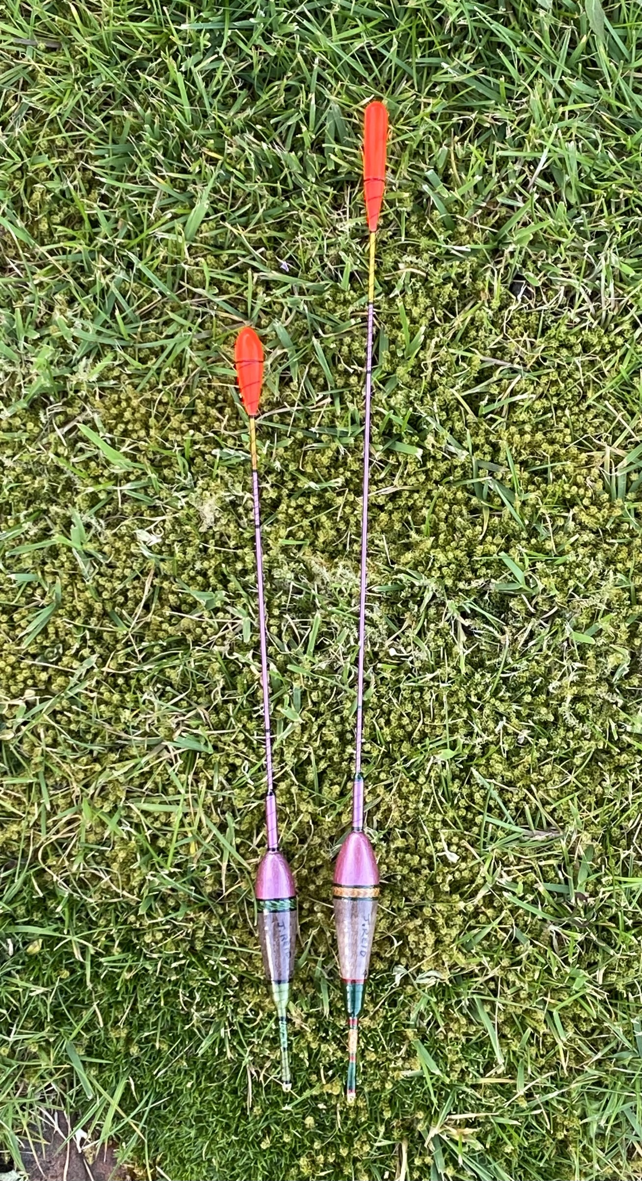 A pair of traditional style carbon stem drift beater floats.