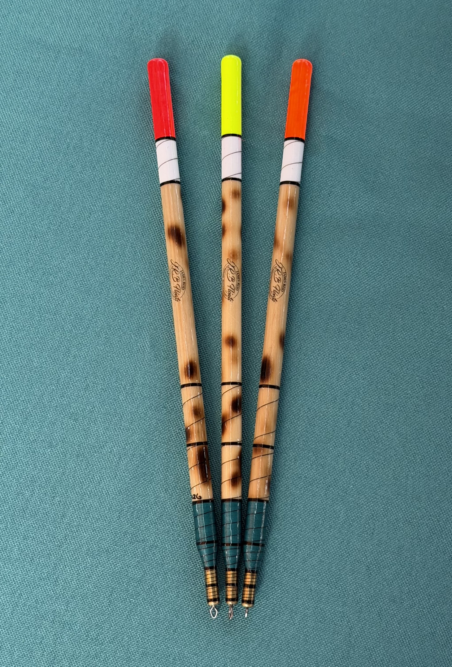 A Set of three traditional style Loaded Scorched Reed Wagler floats